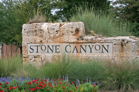 Picture of large stone entrance sign for Stone Canyon neighborhood.