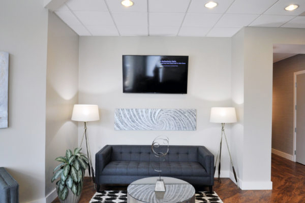 Picture of couch and table in entry.
